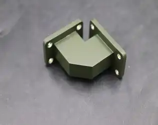 How Do Material Choices Influence the Performance of Waveguide Miter Bends